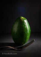 Avocado with fork